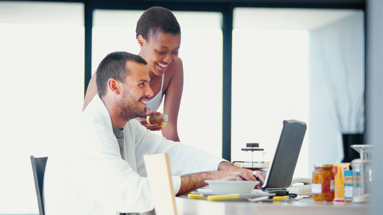 Couple looking at their e-statements online.